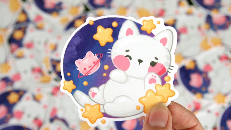 Eco-white die cut sticker with a cat design