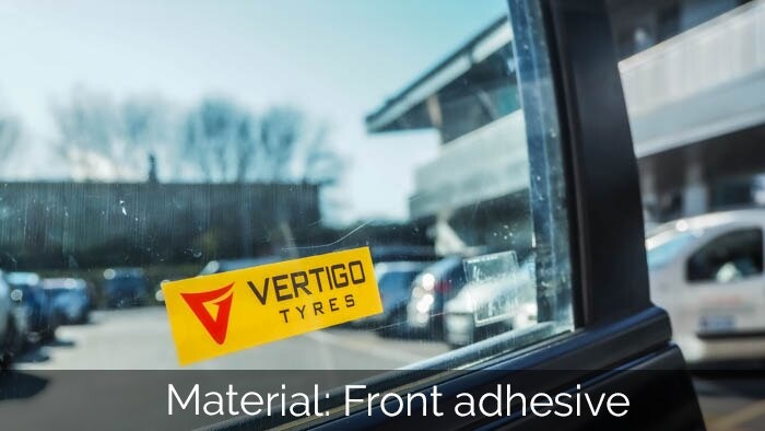 Rectangular car sticker printed on front adhesive vinyl with vertigo logo applied to the inside of the car window