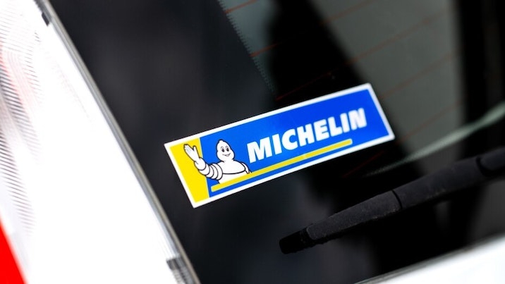 Rectangular car sticker with michelin logo applied tocar window