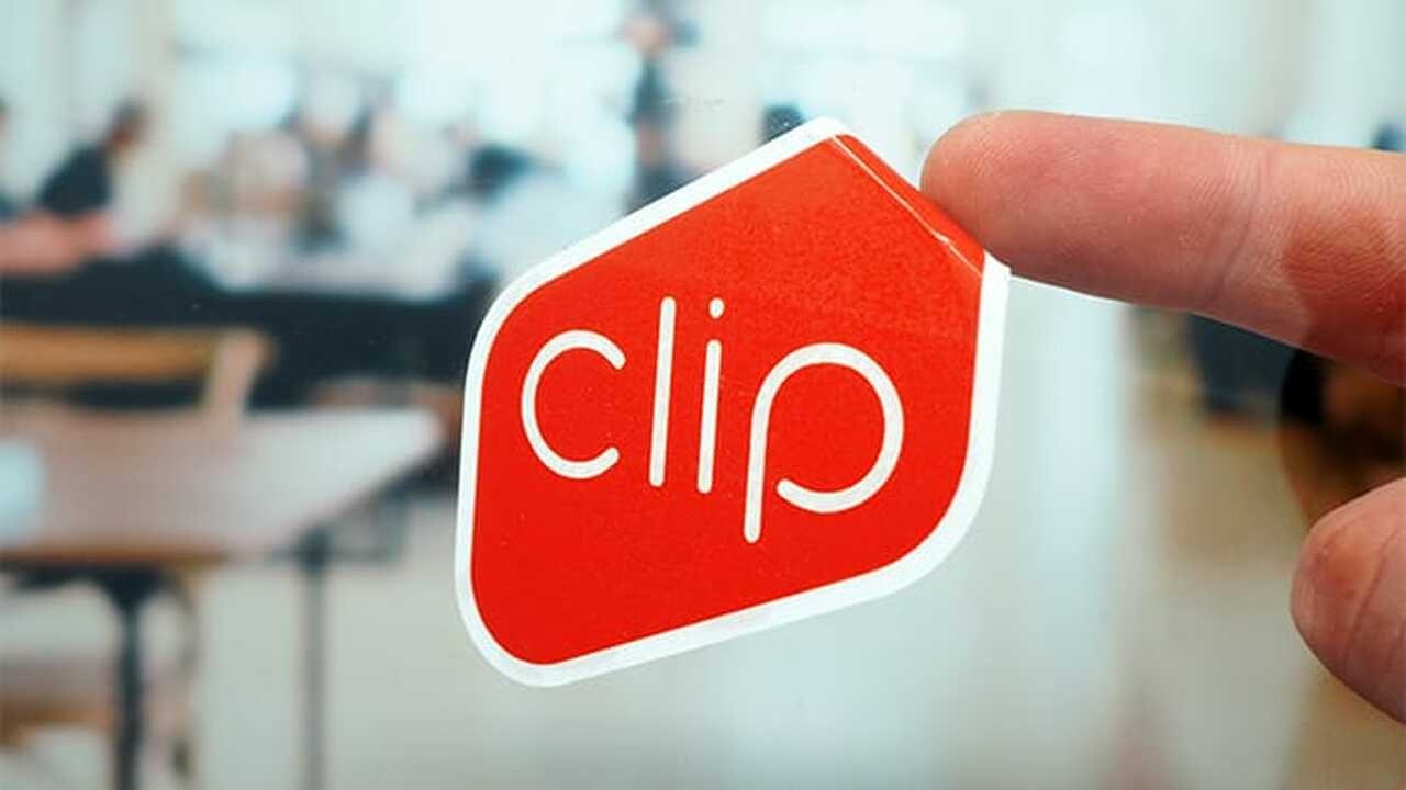Die cut front adhesive sticker with clip logo applied to a window