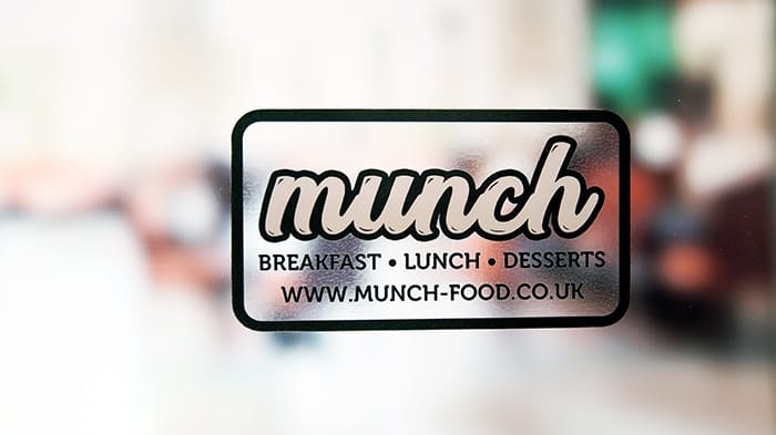 Rounded corners eco-friendly front adhesive stickers with munch logo applied to a window