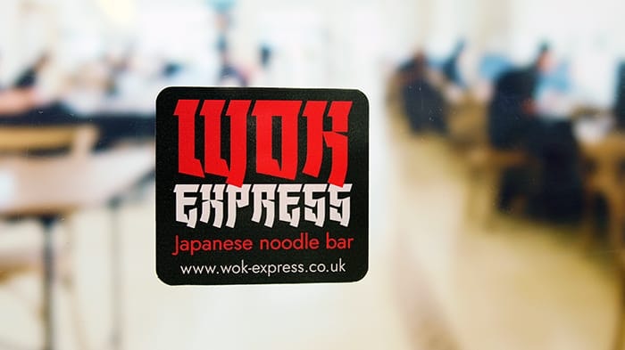 Rounded corners eco-friendly front adhesive stickers with wok express logo applied to a window