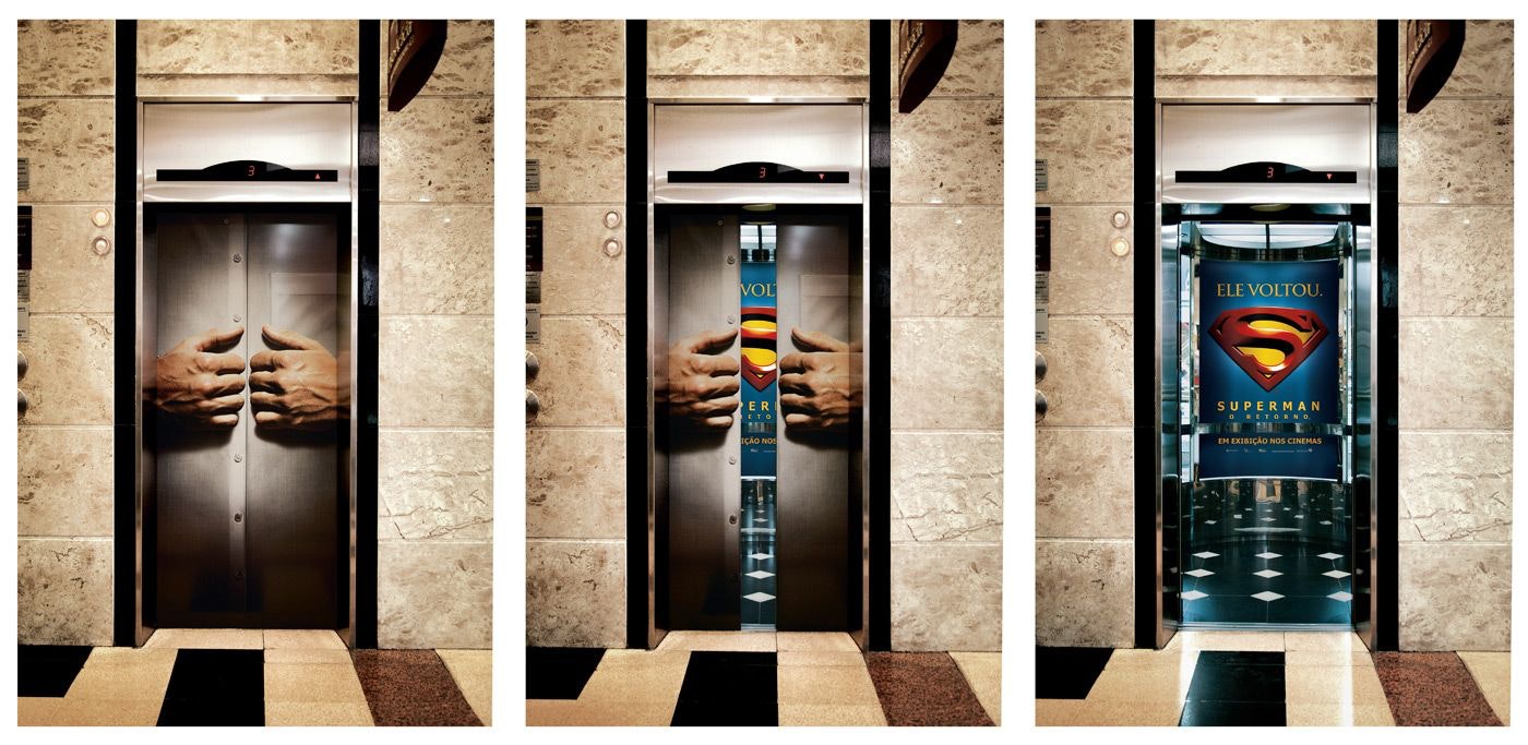 Elevator door opens and shows the superman emblem