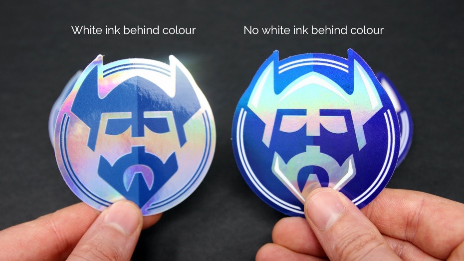 2 holographic stickers in hands 1 with no white ink, 1 with white ink