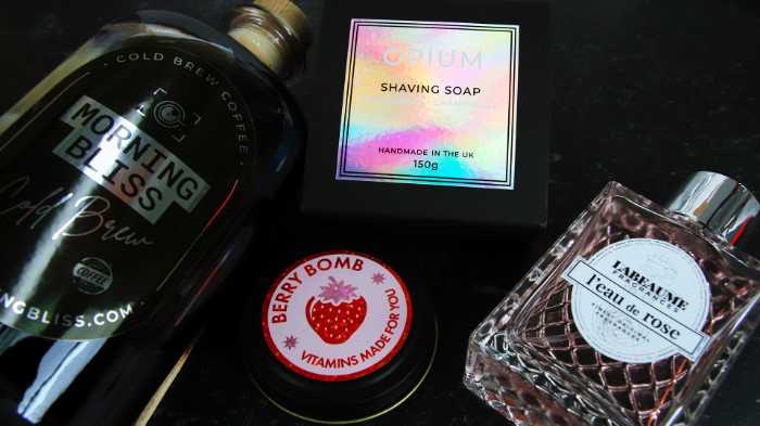 Custom labels of various shapes and sizes printed on several effect materials applied to four different products